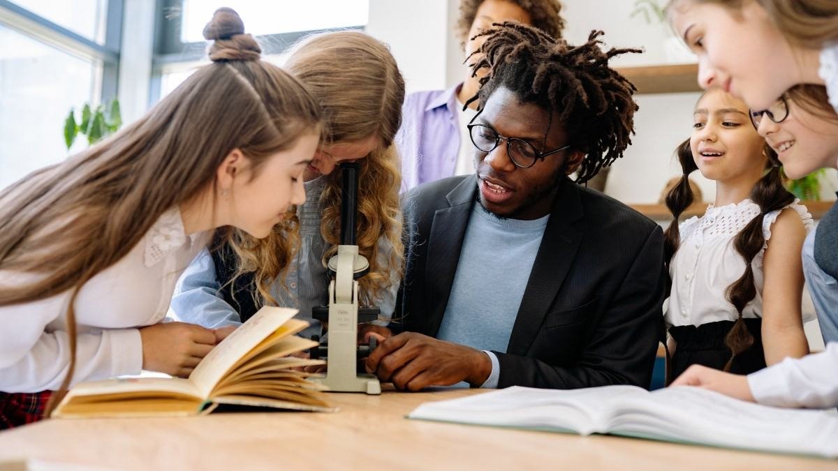 international student meeting professor during university office hours