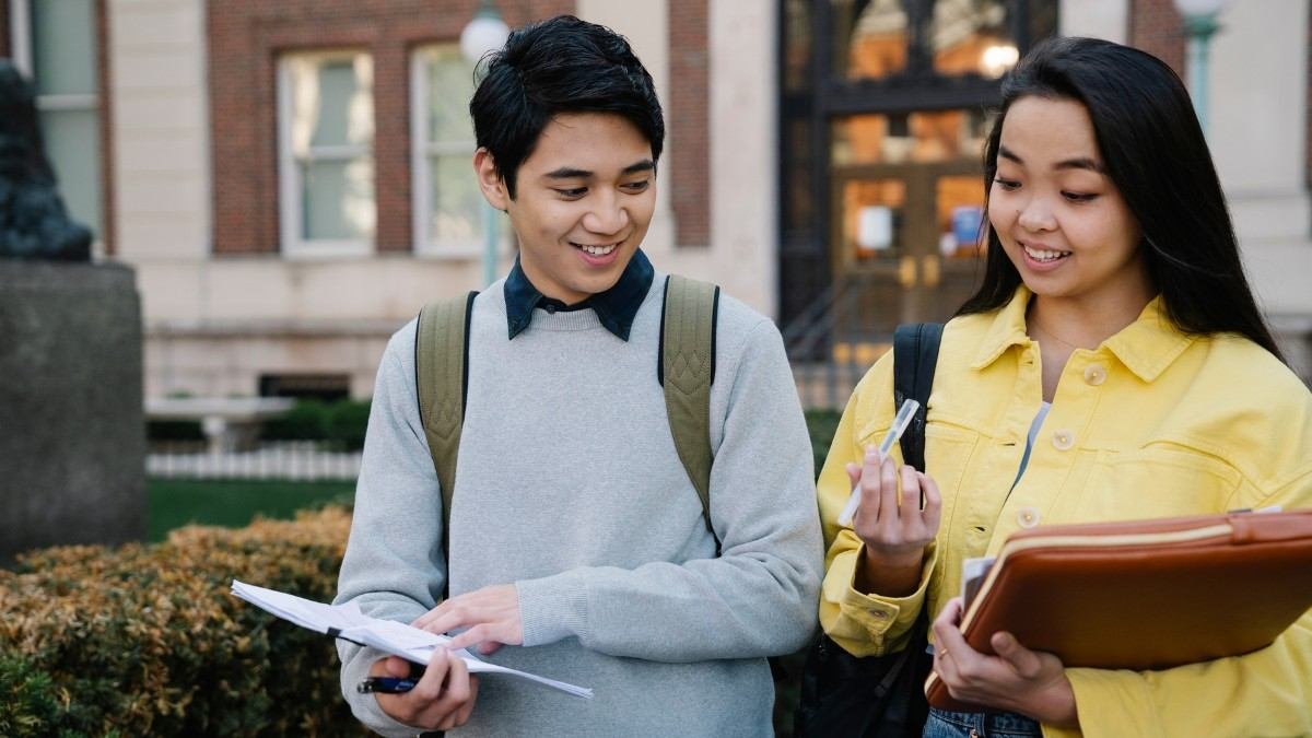 international student checking university timetable